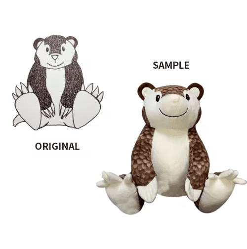 Character design next to the finished plush sample
